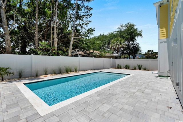 713 9th Ave S, North Myrtle Beach, SC 29582 - view of pool with a patio and a fenced backyard