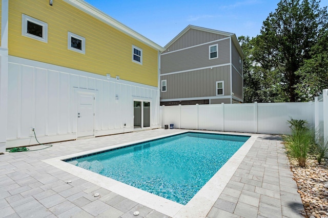 713 9th Ave S, North Myrtle Beach, SC 29582 - view of swimming pool featuring a patio and a fenced backyard