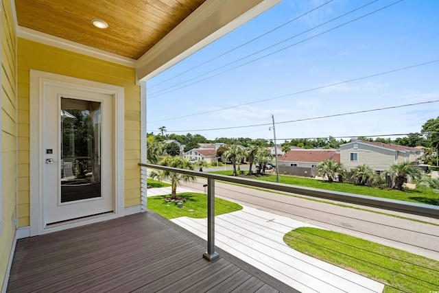 713 9th Ave S, North Myrtle Beach, SC 29582 - wooden deck featuring a residential view