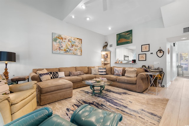 living room with ceiling fan, visible vents, wood finished floors, and recessed lighting