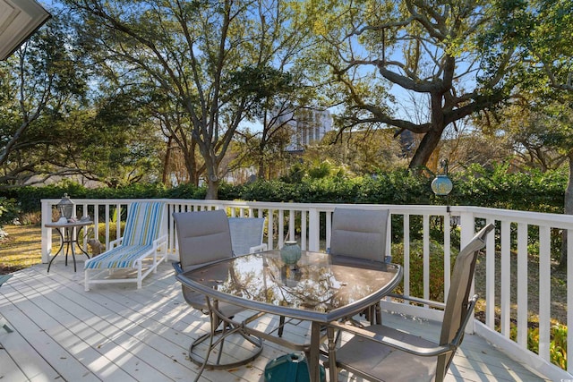 deck with outdoor dining space