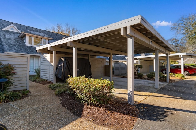 view of parking with a carport