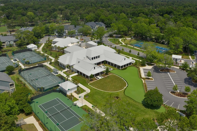 aerial view featuring a residential view and a view of trees