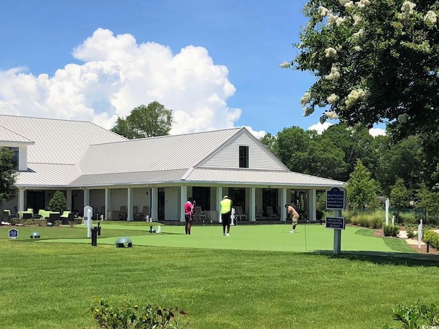 view of community featuring a yard