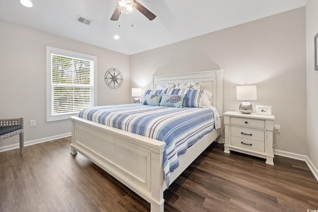 bedroom featuring dark wood-style floors, recessed lighting, visible vents, and baseboards