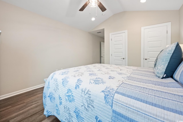 bedroom featuring lofted ceiling, ceiling fan, baseboards, and dark wood-type flooring