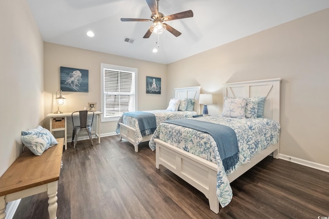 bedroom with baseboards, dark wood finished floors, and recessed lighting