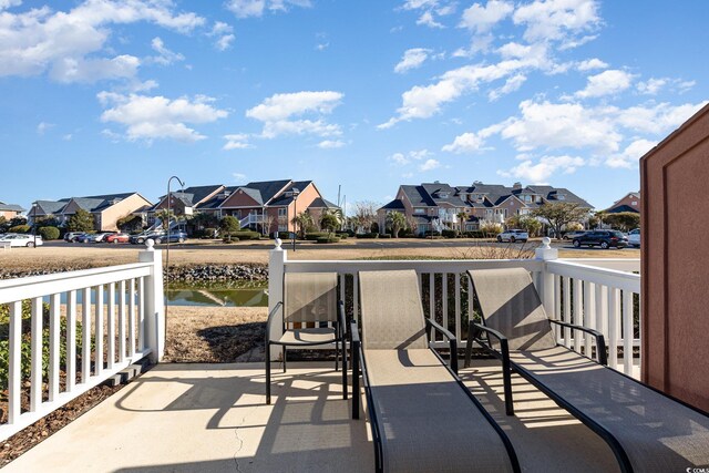 view of patio with a residential view