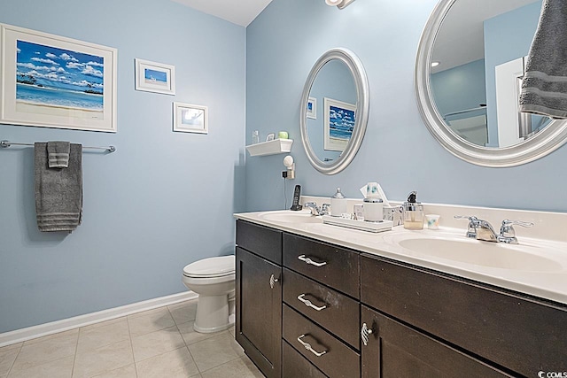 full bathroom featuring a sink, baseboards, toilet, and tile patterned floors