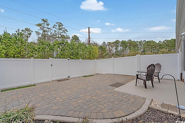 view of patio featuring a fenced backyard