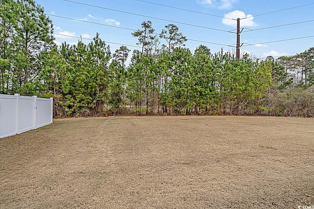 view of yard with fence