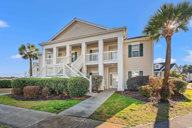 neoclassical / greek revival house with covered porch