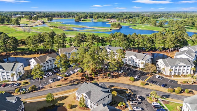 birds eye view of property with a residential view and a water view