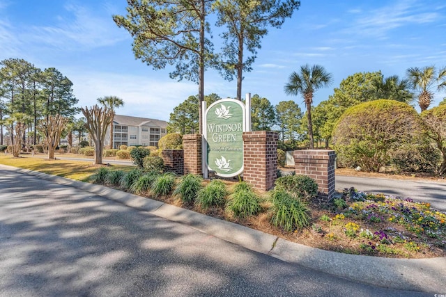 view of community sign