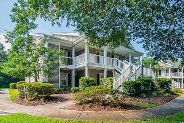 view of property with stairway