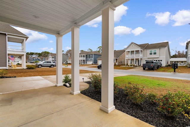 1043 Harbison Cir, Myrtle Beach, SC 29579 - view of patio / terrace featuring a residential view and covered porch