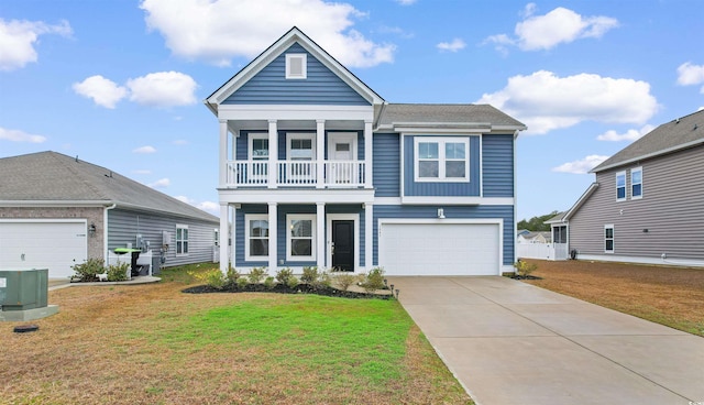1043 Harbison Cir, Myrtle Beach, SC 29579 - view of front of house with a balcony, an attached garage, a front yard, and concrete driveway