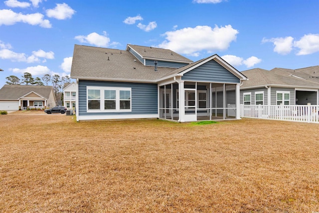 1043 Harbison Cir, Myrtle Beach, SC 29579 - back of property with a sunroom and a shingled roof