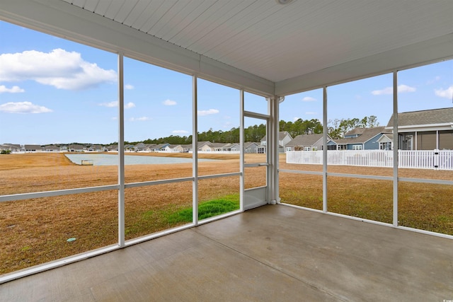 1043 Harbison Cir, Myrtle Beach, SC 29579 - unfurnished sunroom with a residential view and a water view