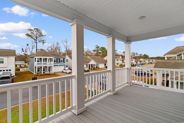 1043 Harbison Cir, Myrtle Beach, SC 29579 - wooden terrace with a residential view and covered porch