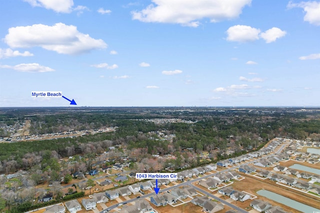 1043 Harbison Cir, Myrtle Beach, SC 29579 - aerial overview of property's location featuring nearby suburban area and a heavily wooded area