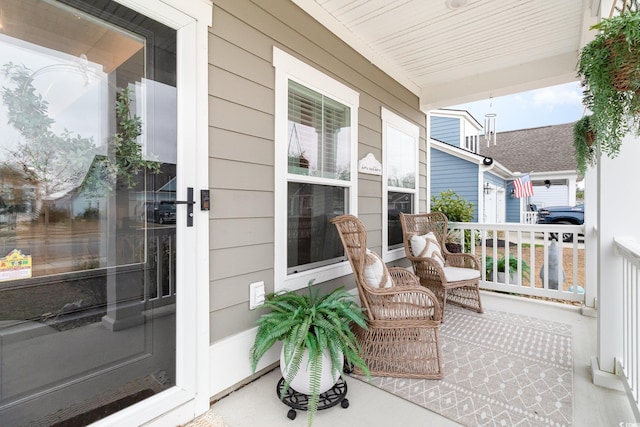 exterior space with a porch and a sunroom