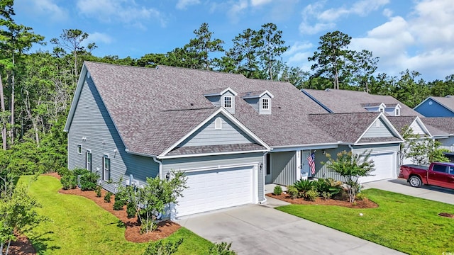 662 Sunnyside Dr Unit 101, Murrells Inlet, SC 29576 - view of front of property with a garage, a front lawn, driveway, and a shingled roof