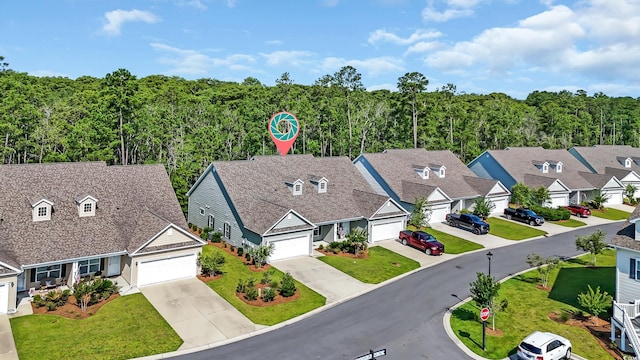 662 Sunnyside Dr Unit 101, Murrells Inlet, SC 29576 - aerial perspective of suburban area with a forest