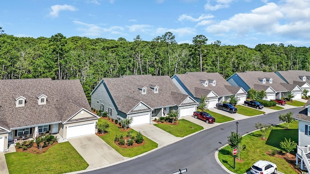 662 Sunnyside Dr Unit 101, Murrells Inlet, SC 29576 - aerial perspective of suburban area featuring a forest