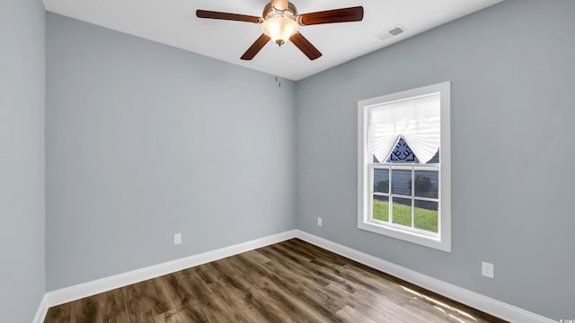 662 Sunnyside Dr Unit 101, Murrells Inlet, SC 29576 - unfurnished room featuring dark wood finished floors and a ceiling fan