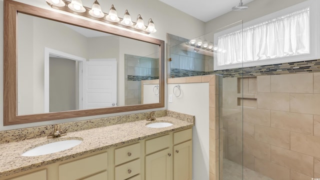 662 Sunnyside Dr Unit 101, Murrells Inlet, SC 29576 - bathroom featuring a tile shower and double vanity