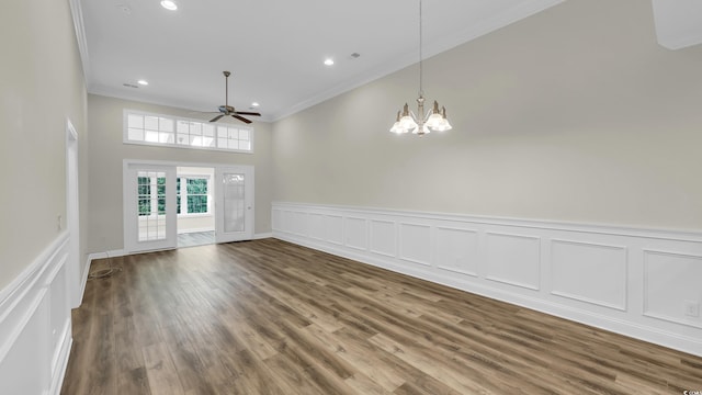 662 Sunnyside Dr Unit 101, Murrells Inlet, SC 29576 - spare room with crown molding, a chandelier, a decorative wall, recessed lighting, and wood finished floors
