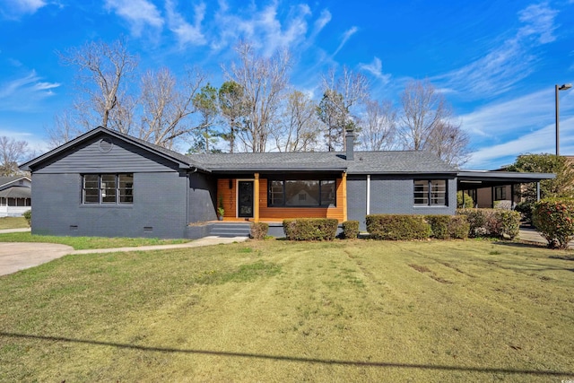 single story home featuring crawl space, a front lawn, and brick siding