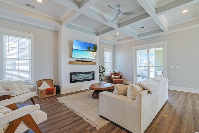 living area featuring a large fireplace, coffered ceiling, visible vents, beam ceiling, and dark wood finished floors