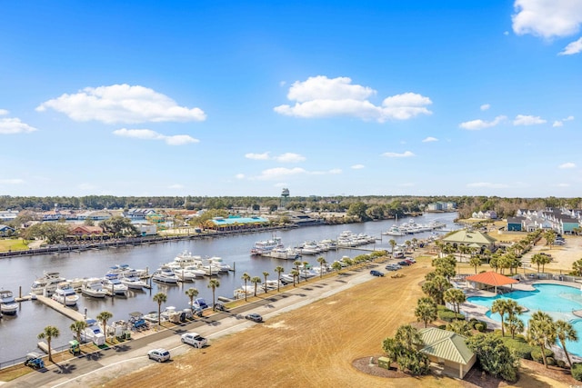 birds eye view of property with a water view