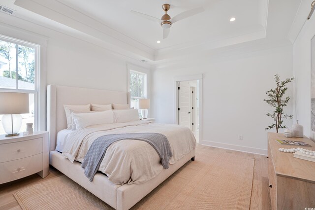 1328 Foxtail Dr, Longs, SC 29568 - bedroom with a raised ceiling, light wood finished floors, recessed lighting, a ceiling fan, and baseboards