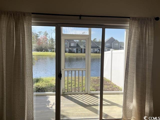 doorway with a water view