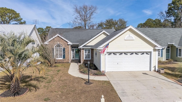 ranch-style house featuring a garage, a front lawn, concrete driveway, and brick siding