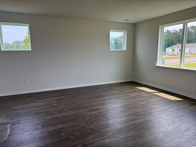 1001 Cavaletti Ct, Myrtle Beach, SC 29588 - empty room with dark wood-type flooring and baseboards