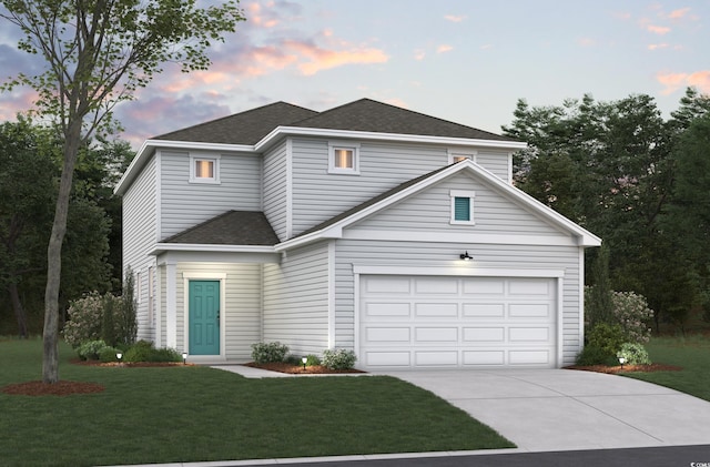 traditional-style home with a garage, driveway, a shingled roof, and a front yard