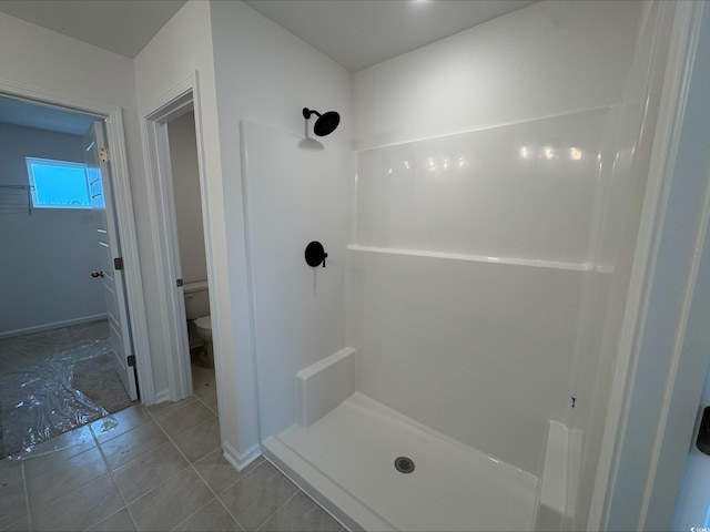1001 Cavaletti Ct, Myrtle Beach, SC 29588 - full bath featuring a stall shower, tile patterned floors, and toilet