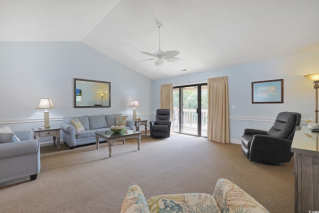 living room with visible vents, a ceiling fan, a textured ceiling, carpet floors, and vaulted ceiling