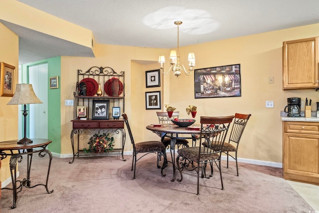 2276 Essex Dr Unit H, Surfside Beach, SC 29575 - dining space with a chandelier, baseboards, and light colored carpet