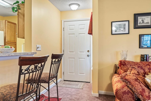 2276 Essex Dr Unit H, Surfside Beach, SC 29575 - carpeted entrance foyer featuring baseboards and a textured ceiling