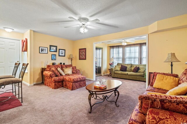 2276 Essex Dr Unit H, Surfside Beach, SC 29575 - kitchen with range with electric stovetop, black microwave, freestanding refrigerator, a chandelier, and light countertops