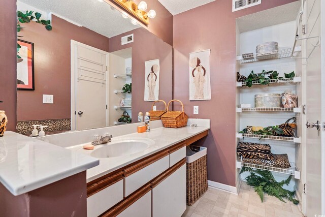 2276 Essex Dr Unit H, Surfside Beach, SC 29575 - bedroom featuring carpet, a textured ceiling, and baseboards