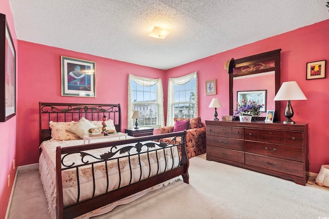 2276 Essex Dr Unit H, Surfside Beach, SC 29575 - bedroom featuring light colored carpet, a textured ceiling, and a closet