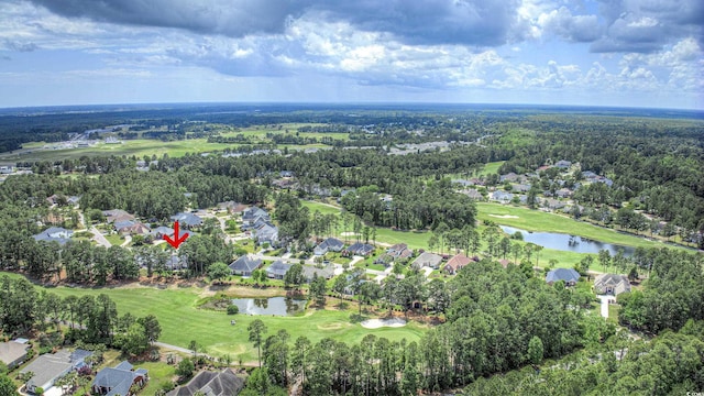 aerial view with view of golf course, a water view, and a residential view