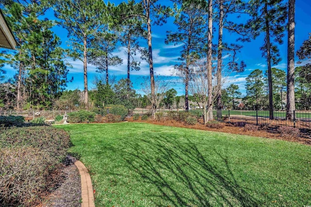 view of yard with fence