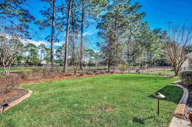 view of yard featuring fence